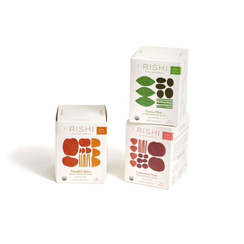 Three limited edition boxes of rich organic teas, featuring Seasonal Sachet Bundles with flavors of winter, displayed on a white background.