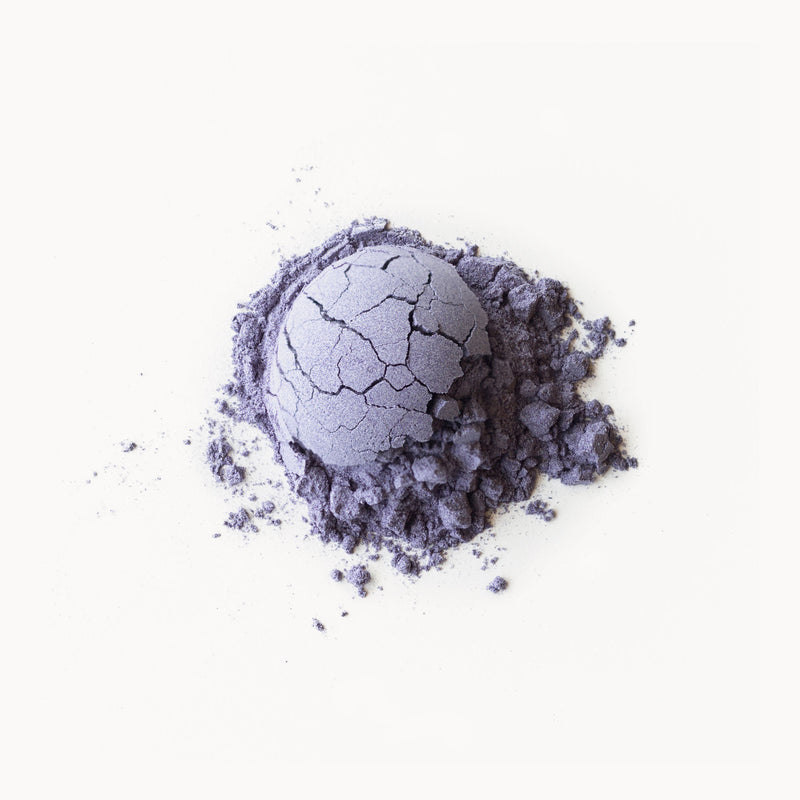 A Butterfly Pea Limeade Powder on a white background by Rishi Tea & Botanicals.