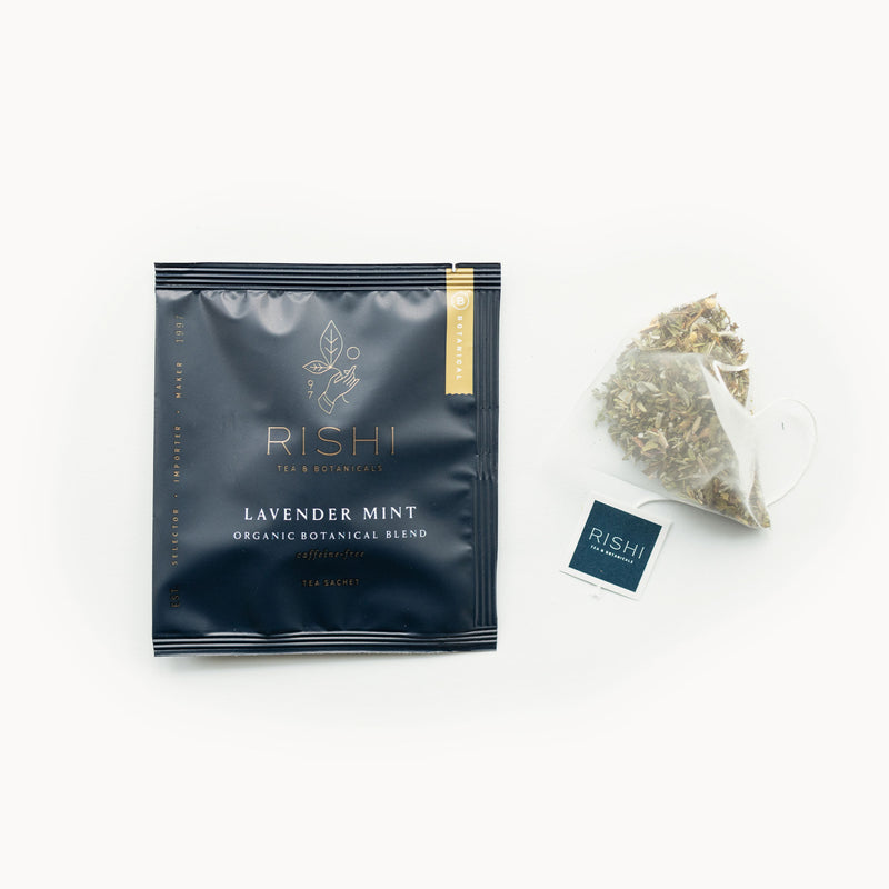 A bag of Lavender Mint tea from Rishi Tea & Botanicals with a tea bag next to it.