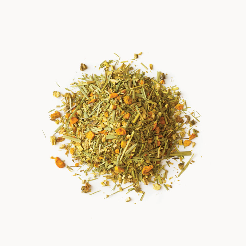 A pile of Rishi Tea & Botanicals Turmeric Ginger on a white background.